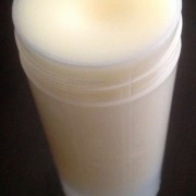 Transparent Empty Plastic Deodorant Container - Twist-Up, Top-Fill, Cylinder filled with deodorant